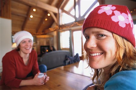 Two Women Sitting at Table in Ski Chalet Stock Photo - Rights-Managed, Code: 700-00167714