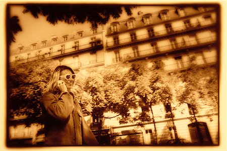 paris sepia - Woman Using Cell Phone Outdoors Paris, France Stock Photo - Rights-Managed, Code: 700-00168060