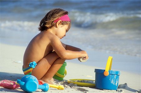 simsearch:700-01072527,k - Girl Playing on Beach Stock Photo - Rights-Managed, Code: 700-00168316