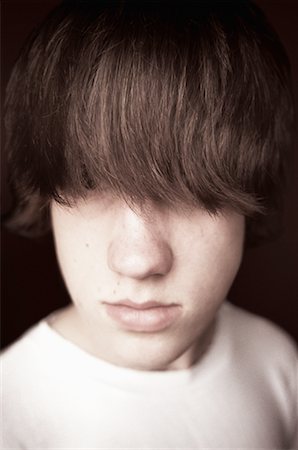 Portrait of Boy with Hair Covering Eyes Stock Photo - Rights-Managed, Code: 700-00168399