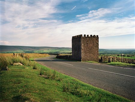 Stone Tower beside Curved Road England Foto de stock - Con derechos protegidos, Código: 700-00168552