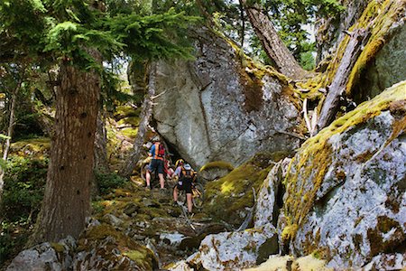 Couple Cycling through Rockies British Columbia, Canada Foto de stock - Con derechos protegidos, Código: 700-00168572