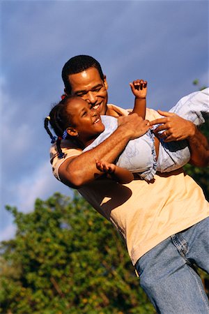 Father and Daughter Playing Stock Photo - Rights-Managed, Code: 700-00168731