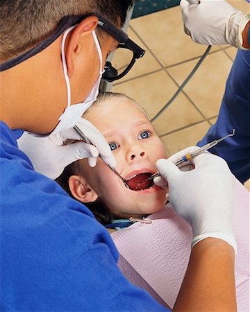 simsearch:700-01194906,k - Girl Receiving Dental Examination Stock Photo - Rights-Managed, Code: 700-00169452