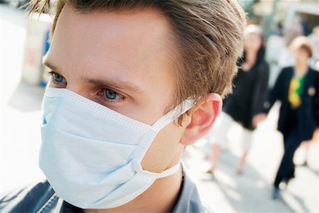 simsearch:700-00806818,k - Man Wearing Face Mask Outdoors Stock Photo - Rights-Managed, Code: 700-00169944