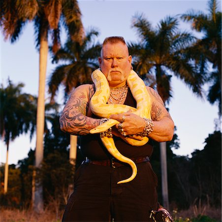 Portrait of Man Holding a Snake Stock Photo - Rights-Managed, Code: 700-00160563