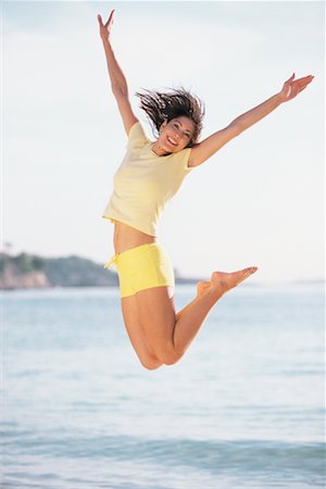 female athletic high jump - Woman Jumping for Joy Stock Photo - Rights-Managed, Code: 700-00160828