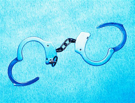 simsearch:600-00150356,k - Handcuffs Stock Photo - Rights-Managed, Code: 700-00161016