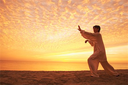 silhouette female martial arts - Woman Doing Tai Chi Stock Photo - Rights-Managed, Code: 700-00161268