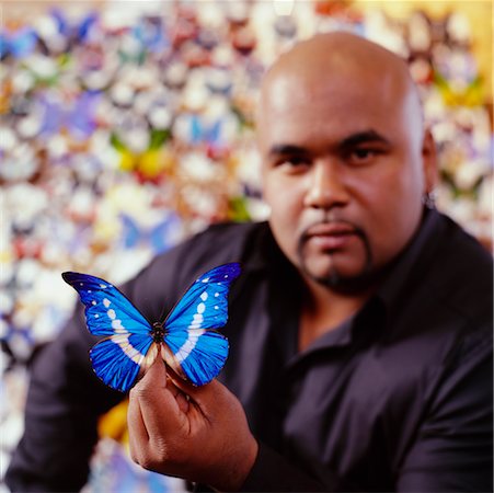 fat man with goatee - Man with Butterfly Collection Stock Photo - Rights-Managed, Code: 700-00161287