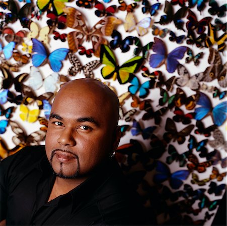 fat man with goatee - Man with Butterfly Collection Stock Photo - Rights-Managed, Code: 700-00161288