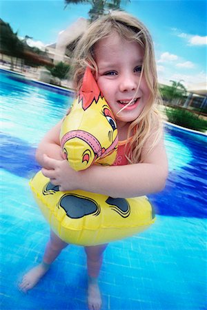 Girl Playing in Swimming Pool Foto de stock - Con derechos protegidos, Código: 700-00161680