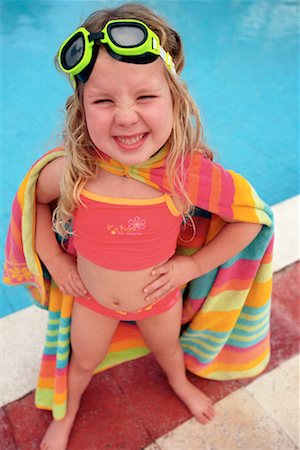 Girl Standing by Swimming Pool Foto de stock - Con derechos protegidos, Código: 700-00161681