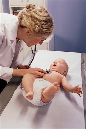 stethoscope girl and boy - Doctor Examining Baby Foto de stock - Con derechos protegidos, Código: 700-00161920