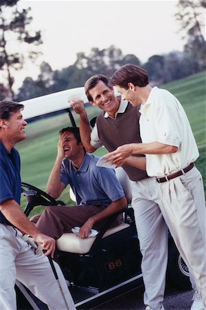 Men Looking at Golf Score Card Foto de stock - Direito Controlado, Número: 700-00163045