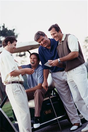 Men Looking at Golf Score Card Foto de stock - Direito Controlado, Número: 700-00163046
