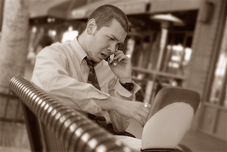 picture of man sitting alone diner - Businessman with Cell Phone and Laptop Outdoors Stock Photo - Rights-Managed, Code: 700-00163379