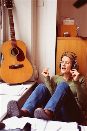 snapping fingers - Woman Listening to Music Stock Photo - Rights-Managed, Code: 700-00163422