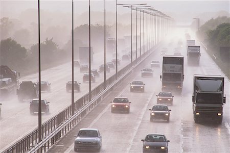 Traffic on Highway in Rain Stock Photo - Rights-Managed, Code: 700-00163511