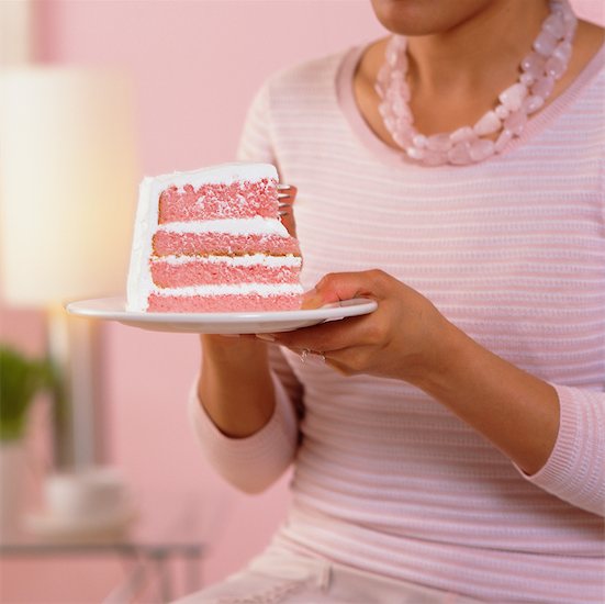 Woman Holding a Piece of Cake Stock Photo - Premium Rights-Managed, Artist: Michael Alberstat, Image code: 700-00163570