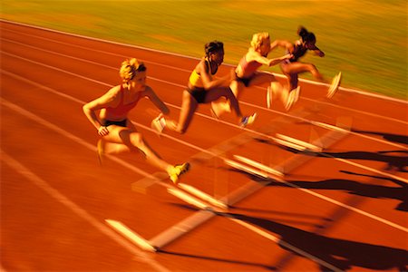 People Jumping Hurdles Foto de stock - Con derechos protegidos, Código: 700-00163709