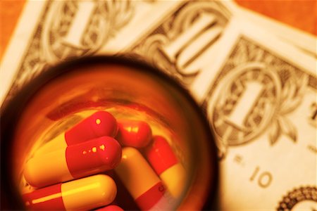 Bottle of Pills and American Currency Stock Photo - Rights-Managed, Code: 700-00178054