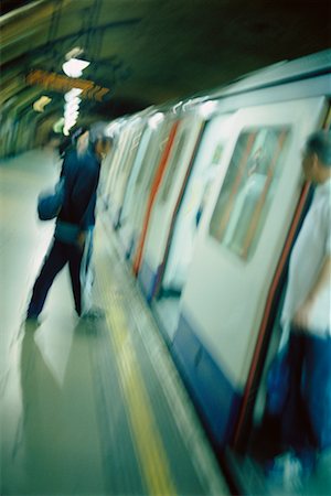simsearch:700-00796210,k - Person Boarding Subway London, England Foto de stock - Con derechos protegidos, Código: 700-00178636