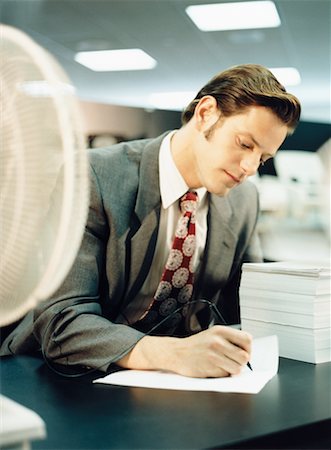 simsearch:700-00552174,k - Businessman Sitting at Desk Writing Stock Photo - Rights-Managed, Code: 700-00178711