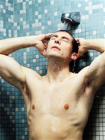 simsearch:700-00506903,k - Man Taking Shower Fotografie stock - Rights-Managed, Codice: 700-00178853