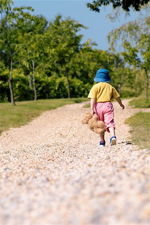 little girl walking away