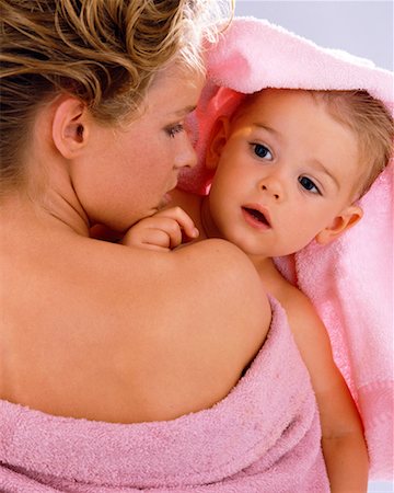 Woman Holding Baby in Towel Stock Photo - Rights-Managed, Code: 700-00170268