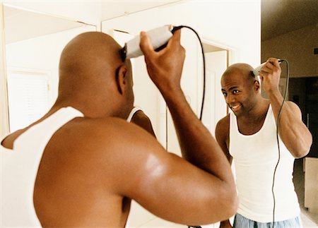 sbarbato - Man Shaving Fotografie stock - Rights-Managed, Codice: 700-00184673