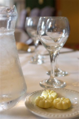 restaurant table food not people not overhead - Wine Glasses and Butter on Dining Table Stock Photo - Rights-Managed, Code: 700-00185004