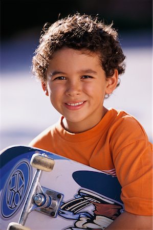 Portrait of Boy with Skateboard Stock Photo - Rights-Managed, Code: 700-00185873
