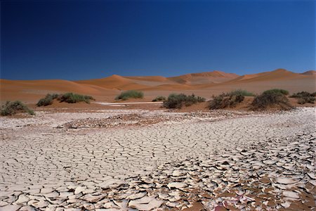 fango arido - Dry Mud Patterns Fotografie stock - Rights-Managed, Codice: 700-00186863