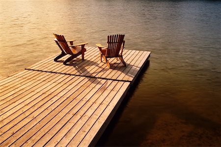 Adirondack Chairs on Dock Fotografie stock - Rights-Managed, Codice: 700-00188040