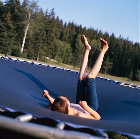 Girl on Trampoline Stock Photo - Rights-Managed, Code: 700-00188105