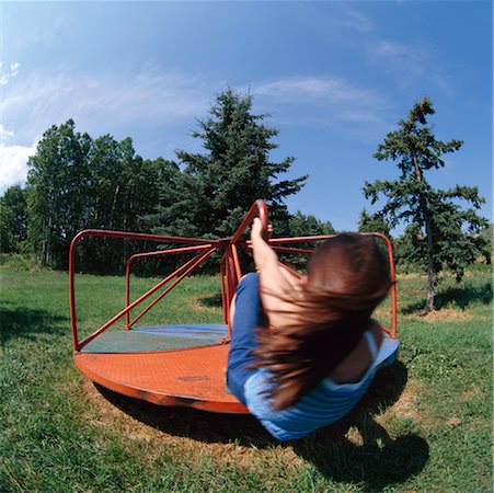 Girl on Merry-go-round Stock Photo - Rights-Managed, Code: 700-00188106