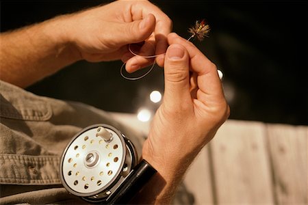 Hands Tying Fly for Fly Fishing Stock Photo - Rights-Managed, Code: 700-00188604