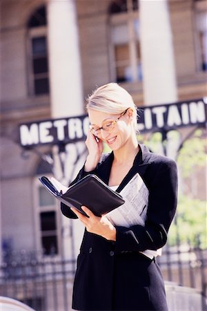 Businesswoman with Agenda and Cell Phone Stock Photo - Rights-Managed, Code: 700-00189519