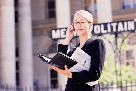 Businesswoman with Agenda and Cell Phone Stock Photo - Rights-Managed, Code: 700-00189523