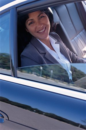 Woman in Back Seat of Car Stock Photo - Rights-Managed, Code: 700-00189559