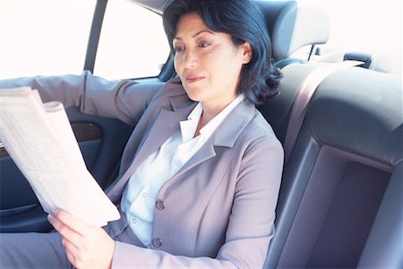 simsearch:700-00094724,k - Woman Reading Newspaper in Car Stock Photo - Rights-Managed, Code: 700-00189562