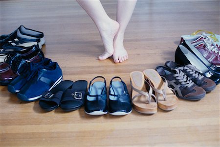 Woman's Feet and Assortment of Shoes Stock Photo - Rights-Managed, Code: 700-00181373