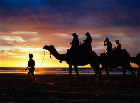 riding on the beach in the sun set - Camel Ride on Cable Beach Australia Stock Photo - Rights-Managed, Code: 700-00181684