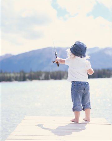 Beautiful Little Girl Catches Fishing Rod Stock Photo 206317624