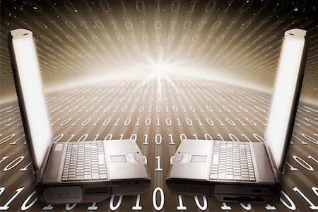 Laptops Facing Each Other on Binary Landscape Stock Photo - Rights-Managed, Code: 700-00194286