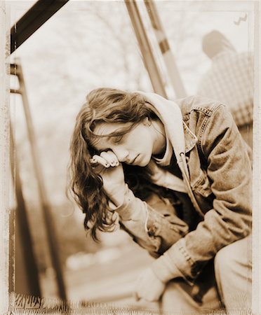 sitting at bus stop - Portrait of Woman Stock Photo - Rights-Managed, Code: 700-00194363