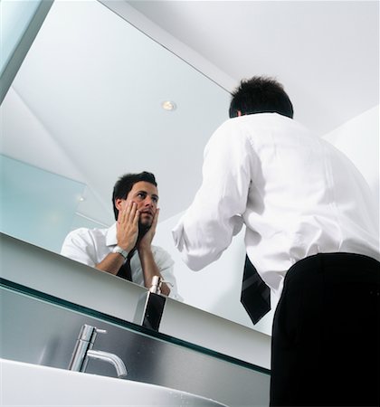Businessman Looking in Mirror Stock Photo - Rights-Managed, Code: 700-00194470