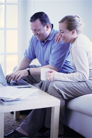 Couple Playing Bills Online Stock Photo - Rights-Managed, Code: 700-00194707